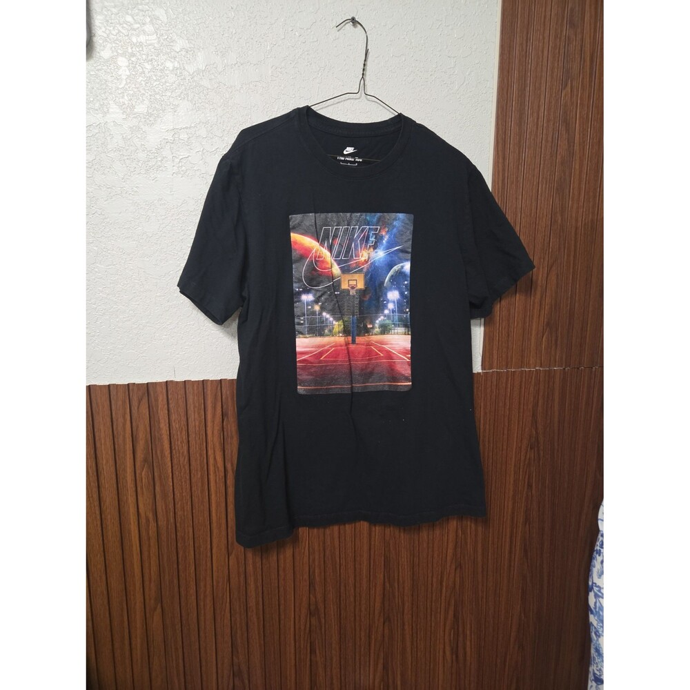 Basketball T-Shirt featuring a graphic of a basketball court under a starry nsw